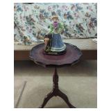 Marlo Collection Figurine on Wooden Accent Table
