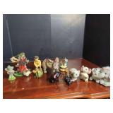 Mixed Figurine Grouping Featuring Circus Elephants, Clowns, and Golfers