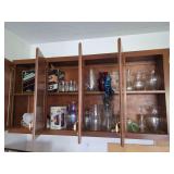 Assorted Glassware and Household Appliances in Wood Cabinets