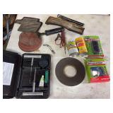 Assorted Tire Repair Kits and Automotive Maintenance Supplies