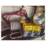 Automotive Maintenance Lot Featuring Pennzoil Seat Covers and Work Lights