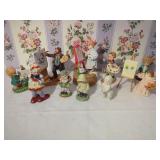 Collection of Art-Themed Ceramic and Porcelain Figurines and Music Boxes
