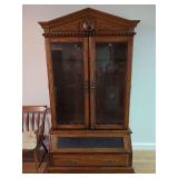 Webb Wooden Gun Cabinet with Carved Lion Crest