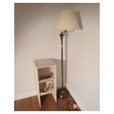 Brass Floor Lamp with Beige Shade and Assorted Household Grouping