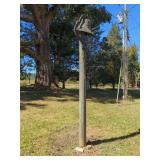 Cast Iron Dinner Bell On Wooden Post