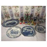 Assorted Blue and White Transferware Platters and Plates with Ceramic Figurines