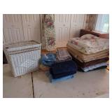 Assorted Bathroom Linens and White Wicker Storage Basket