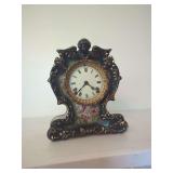 Ansonia Wauvesha Porcelain Mantle Clock with Floral Decor and Cherub Motif
