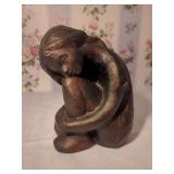 Cast Iron Figural Sculpture of Seated Female Figure