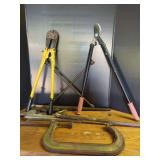 Assorted Hand Tools Including Bolt Cutters, Pipe Wrenches, and C-Clamps
