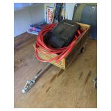 Wooden Yard Cart with Red Hose and Troy-Bilt Bag