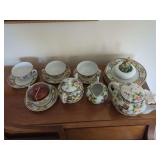 Hand-Painted Porcelain Tea Set with Floral and Geometric Motifs