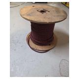 Wooden Spool with Braided Red and Black Rope