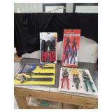 Assorted Hand Tool Sets Including Wrenches, Snippers, and Pliers