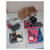 Automotive Components Assortment: Brake Pads, Motor Mount, and Ignition Cables