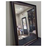 Large Framed Wall Mirror with Sectioned Glass and Decorative Rosette Accents