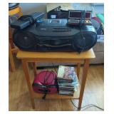 Electronics Lot with Sanyo Boombox, Onn CD Player, Spartus Clock, and CDs