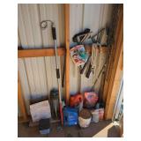 Assorted Shed Contents Featuring Stihl Trimmer Line, Hand Tools, and Lubricants