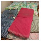 Assorted Outdoor Patio Cushions with Various Prints and Colors