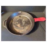 Lodge Wildlife Series Elk Cast Iron Skillet with Red Silicone Handle