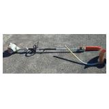 Stihl KM 56 RC-E CombiEngine with Trimmer and Pole Saw Attachments