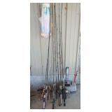 Assorted Fishing Rods, Reels, and Tackle Boxes