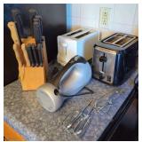 Kitchen Appliance Lot including Toasters, Hand Mixer, and Knife Block Set