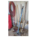 Assorted Garden Tools, Hose, and Rakes