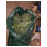 Large pre lit Christmas tree in storage bag