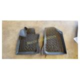 Custom fit front floor mats for unknown vehicle.