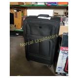 LARGE SOFT SIDE PREOWNED SUIT CASE ON