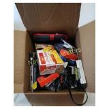 Box of assorted cell phone accessories, cords,