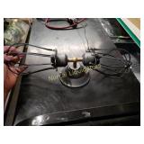 Double bulb caged outdoor patio light fixture.