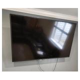 Sharp 65' smart tv with legs and wall hanger
