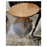 47' table with 2 leaves and 5 chairs