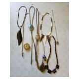 Bolo ties and assorted costume jewelry one piece