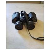 Tasco binoculars 7x-15x35