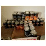 28 cans of various years of sturgis rally Harley
