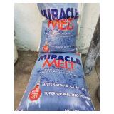 2 50lb unopened bags of ice melt and a partial