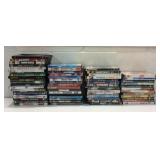 Assortment of Over 50 DVDs K14E