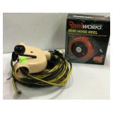 Two Reels one NEW /Extension Cord and Pressure S8A