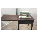 Sewing Machine in a Wood Cabinet M13A