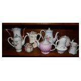 9 Porcelain Teapots/Creamers