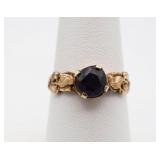 Gold Ring with Purple Stone Accent