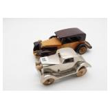 Two Vintage Model Cars: Metal and Wood