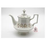 White Ceramic Teapot with Floral Design