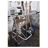JOHNSON 9.9 HP BOAT MOTOR W/ STAND