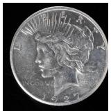 Coin 1927 Peace Silver Dollar Brilliant Unc.