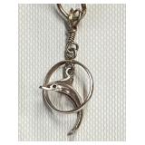 Unmarked Silver Dolphin in Ring   1.3 g   H