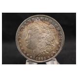 1885 Toned Morgan Silver Dollar